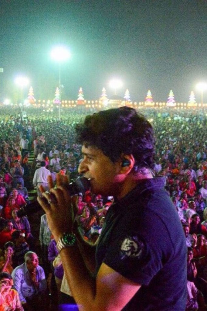 Indian singer Krishnakumar Kunath performs in a concert at a stadium in Mumbai, India.