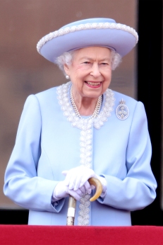 Queen Elizabeth II smiles on the balcony during Trooping The Color on June 02, 2022 in London, England. 
